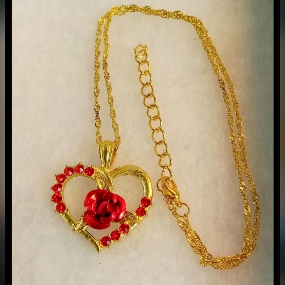 Gold Tone Heart Pendant Necklace with Red Accents
